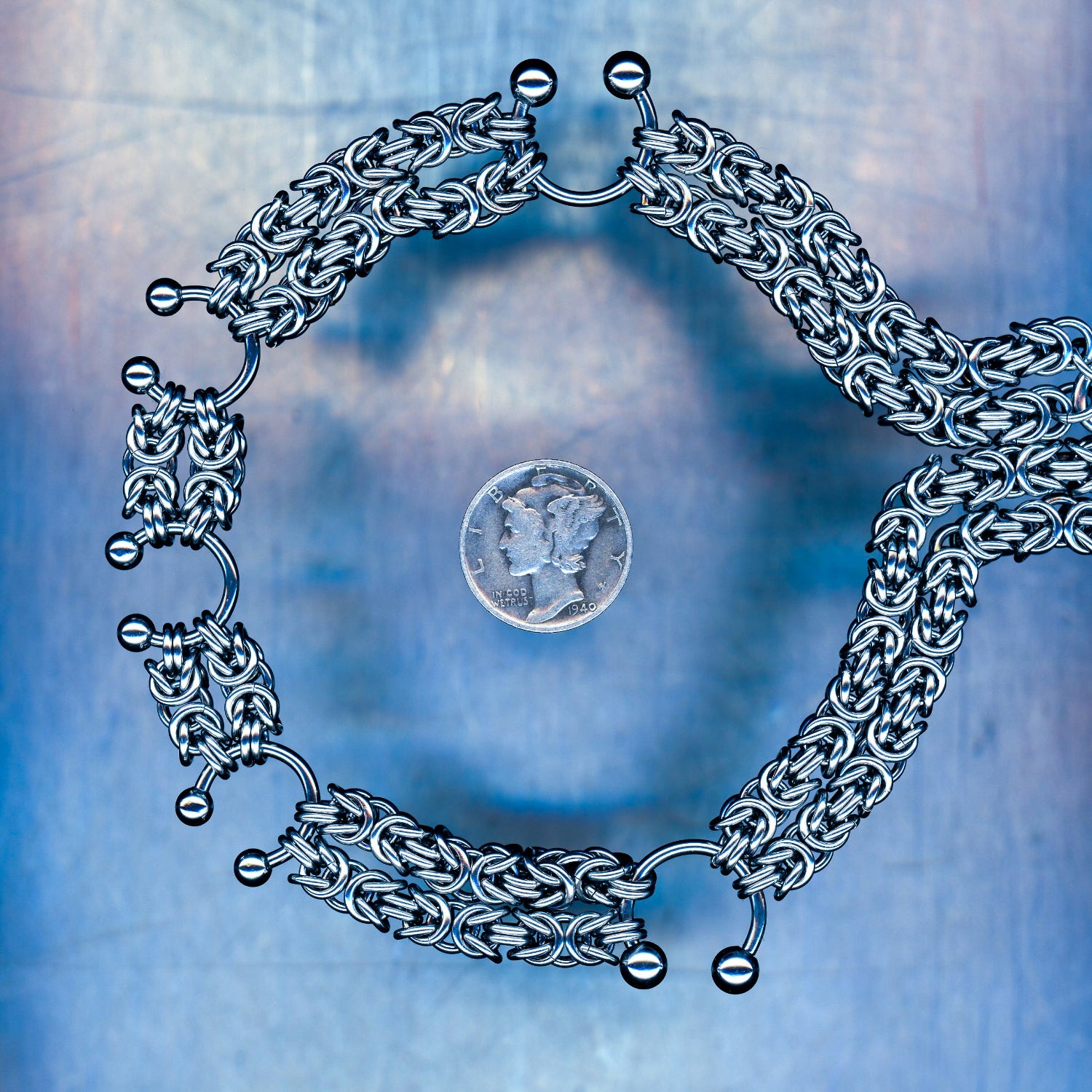 PRODUCT SHOT CLOSEUP SCAN OF DRIFTING WAVE COLLAR NECKLACE 304 STAINLESS STEEL CHAIN MAILLE JEWELRY XS BYZANTINE WEAVE BULLRING HORSESHOE PIERCING ACCENTS