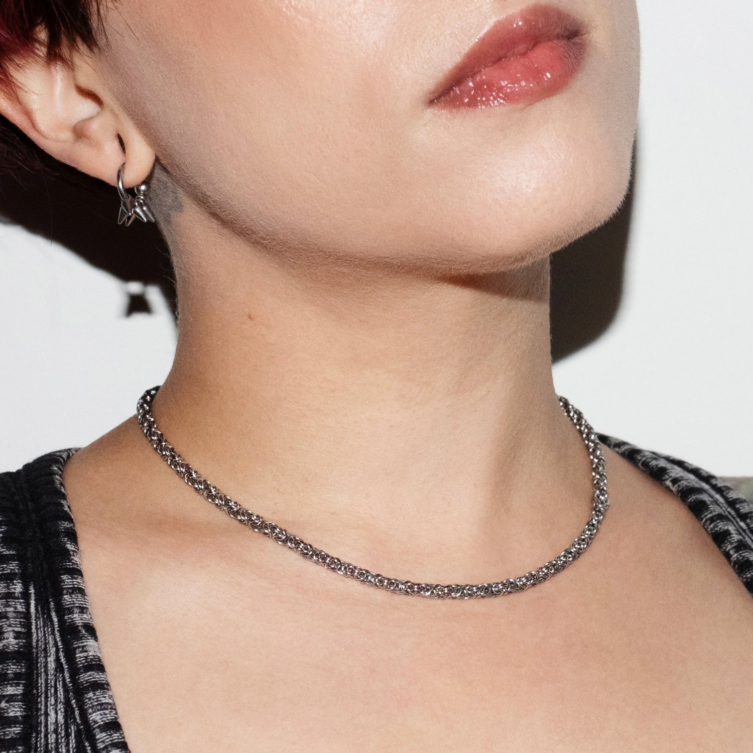 CLOSE UP SHOT ON MODEL OF GHOST BYTE NECKLACE