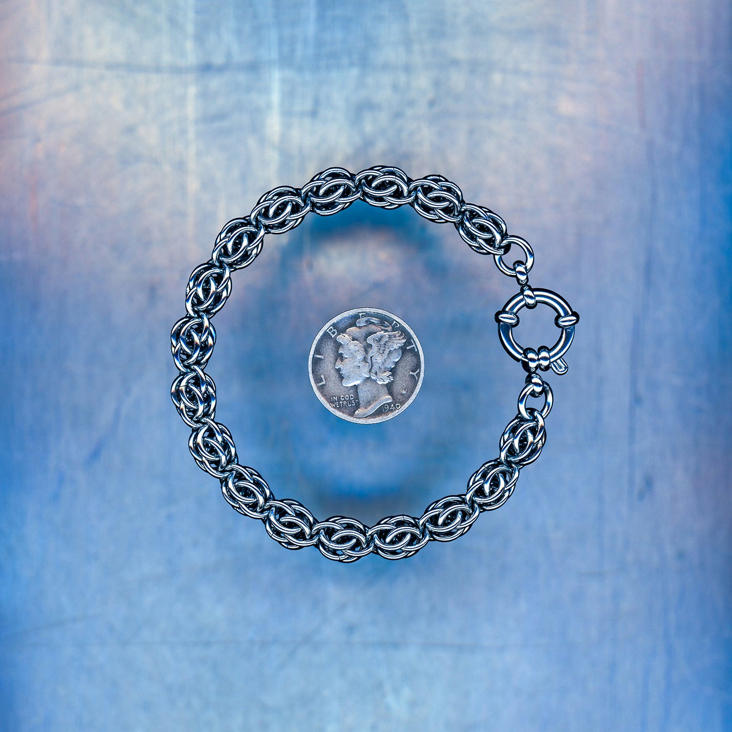 PRODUCT SHOT CLOSEUP SCAN OF BIT LOST SIGNAL CORE BRACELET 304 STAINLESS STEEL CHAIN MAILLE JEWELRY SWEET PEA MEDIUM WEAVE