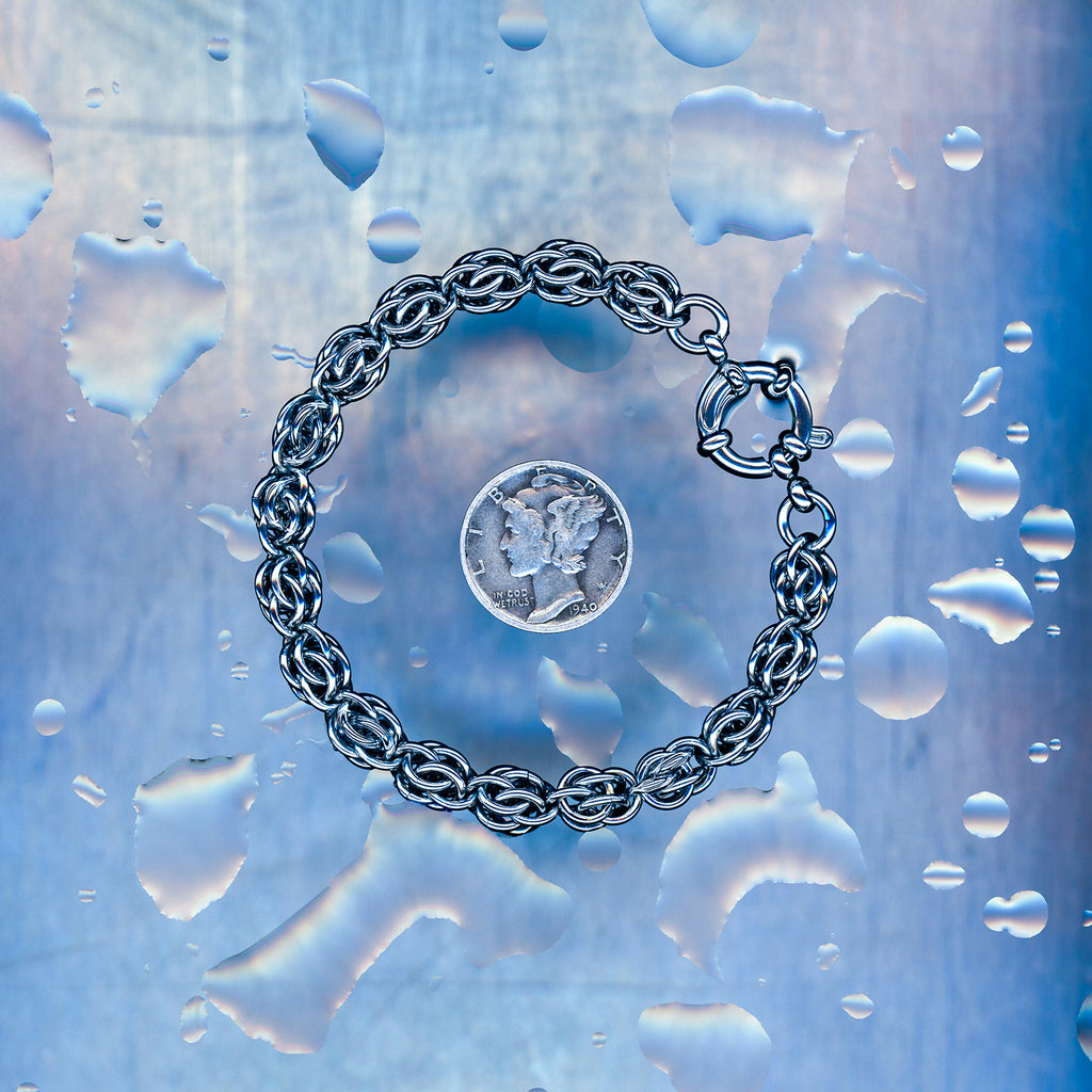 PRODUCT SHOT CLOSEUP SCAN OF BIT LOST SIGNAL CORE BRACELET 304 STAINLESS STEEL CHAIN MAILLE JEWELRY SWEET PEA MEDIUM WEAVE