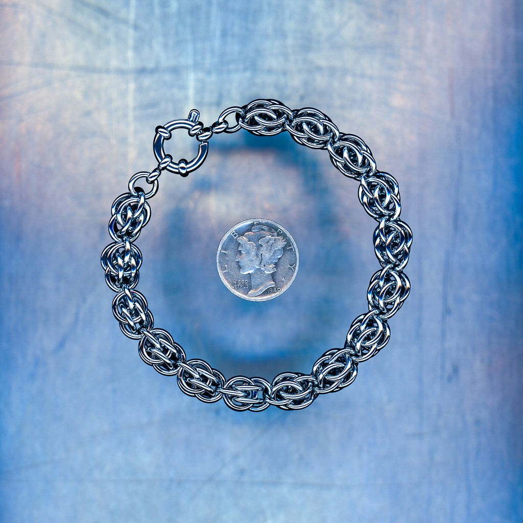 PRODUCT SHOT CLOSEUP SCAN OF LOST SIGNAL WAVE BRACELET 304 STAINLESS STEEL CHAIN MAILLE JEWELRY