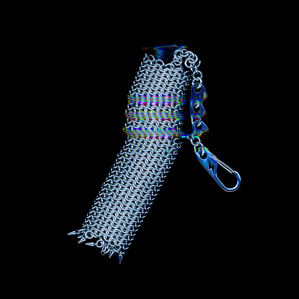 A snug European 4-in-1 chainmaille sleeve for your lighter, finished with dangling spikes that catch the eye. Made with 304 stainless steel. Hangs elegantly from a short chain with a lightning bolt clasp.