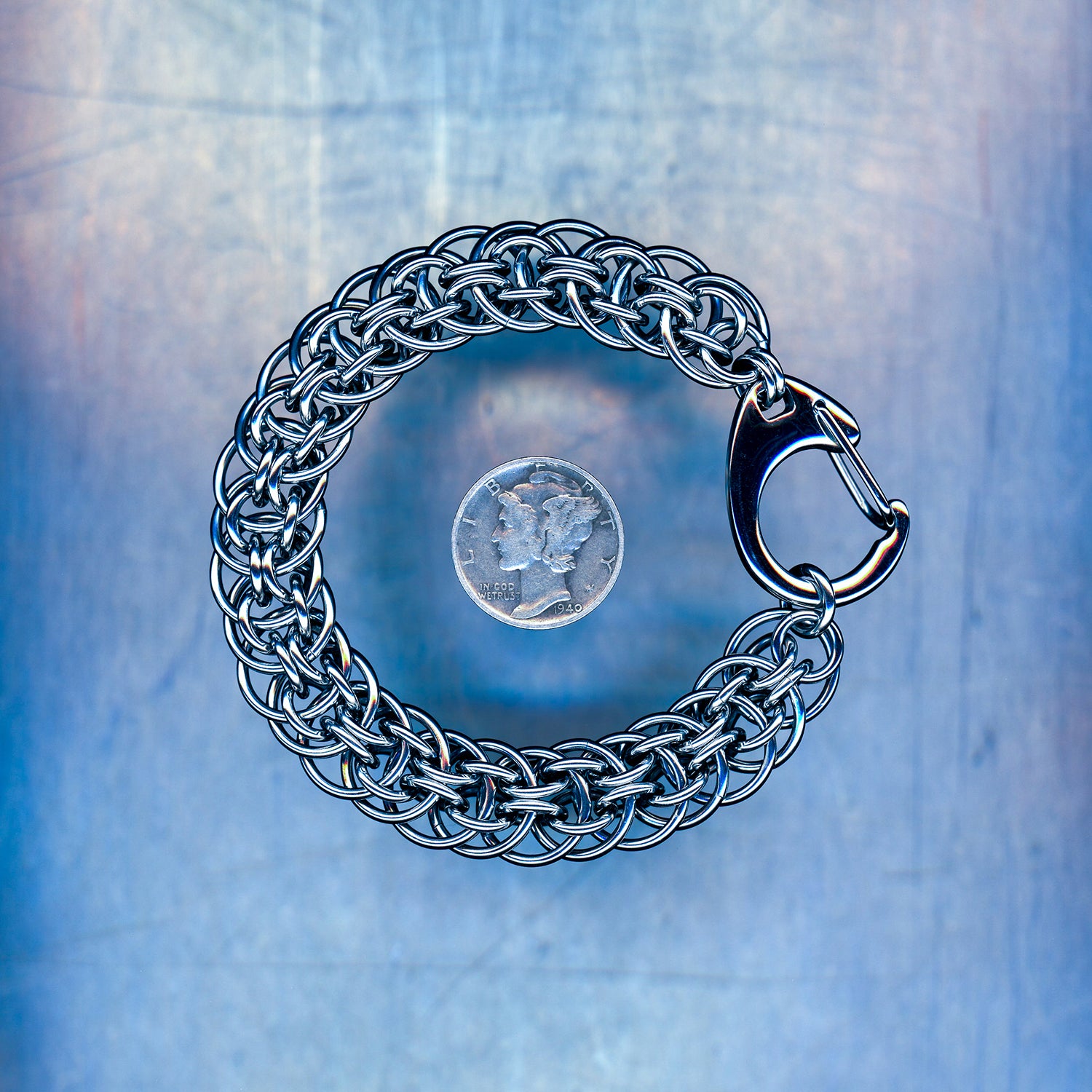 PRODUCT SHOT CLOSEUP SCAN OF PROTOCOL VOID BRACELET 304 STAINLESS STEEL CHAIN MAILLE JEWELRY ORBITAL SUPER BERUS 4 IN 1