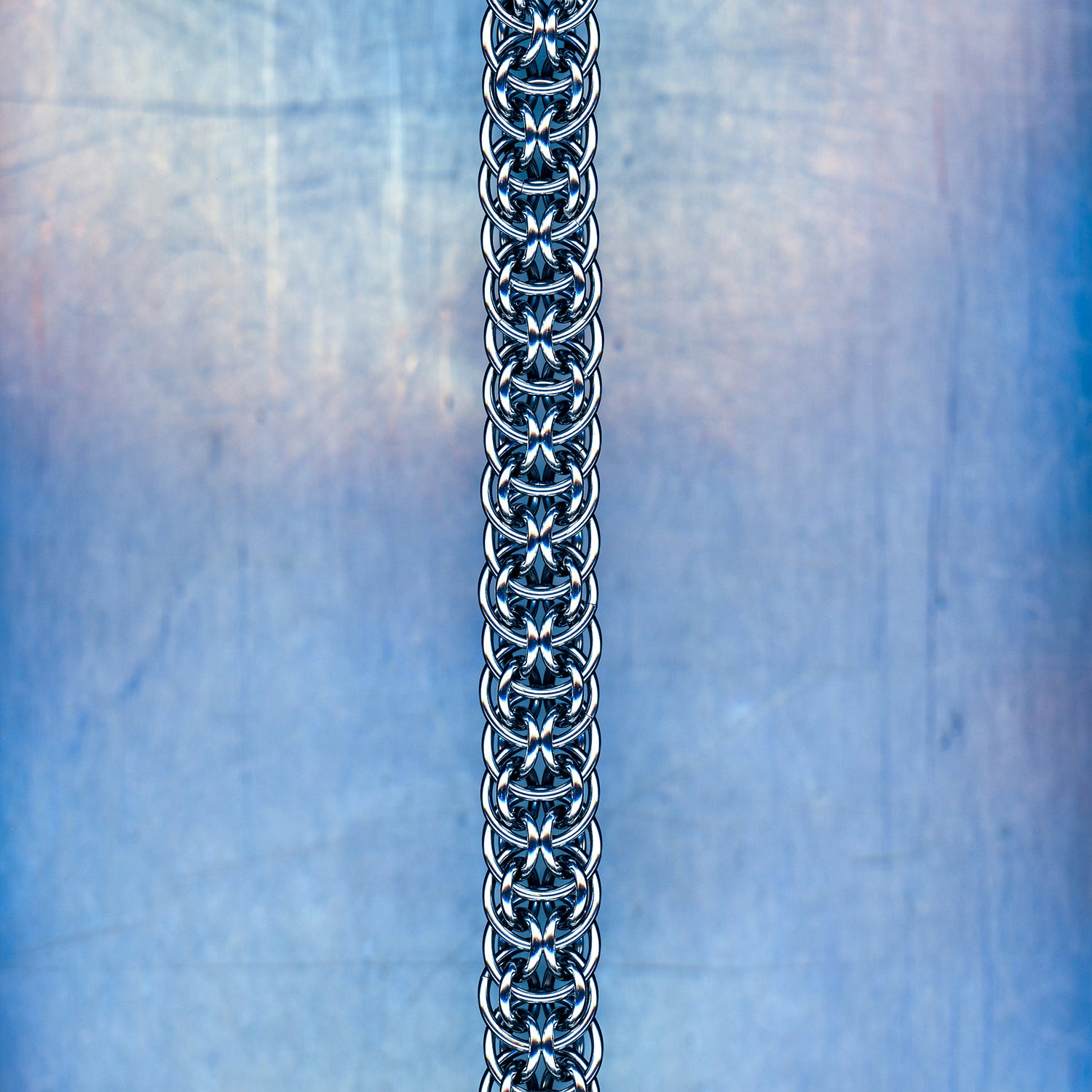 PRODUCT SHOT CLOSEUP SCAN OF PROTOCOL VOID BRACELET 304 STAINLESS STEEL CHAIN MAILLE JEWELRY ORBITAL SUPER BERUS 4 IN 1