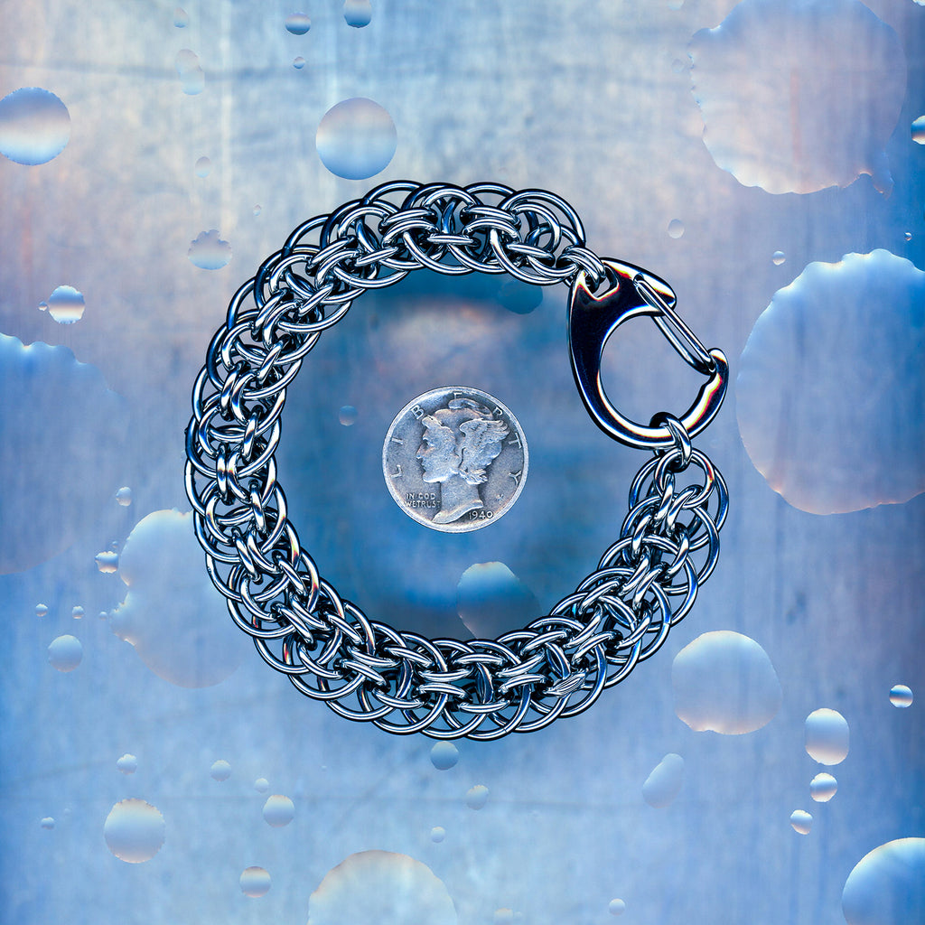 PRODUCT SHOT CLOSEUP SCAN OF PROTOCOL VOID BRACELET 304 STAINLESS STEEL CHAIN MAILLE JEWELRY ORBITAL SUPER BERUS 4 IN 1