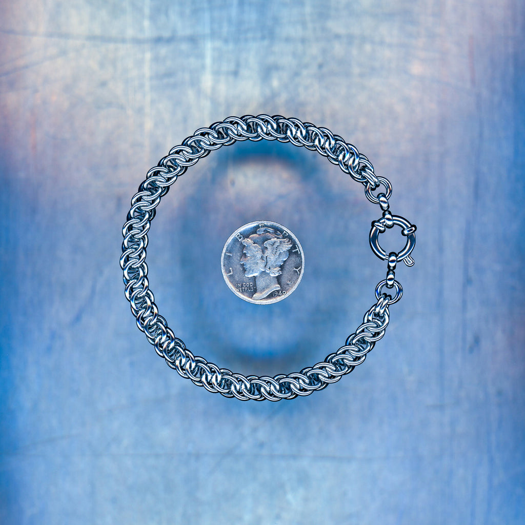 PRODUCT SHOT CLOSEUP SCAN OF PULSE LINK BRACELET 304 STAINLESS STEEL CHAIN MAILLE JEWELRY HALF PERSIAN SYMMETRICAL 3 IN 1 WEAVE